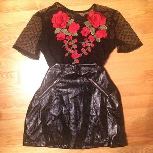Black mesh crop top with red rose appliqué